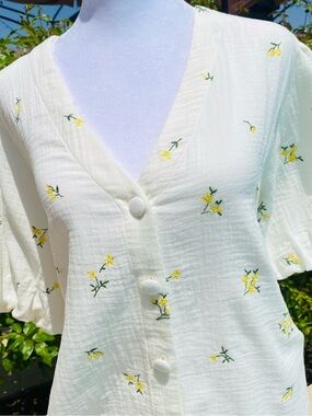 Cream V-Neck Button-Front Blouse with Puffy Sleeves and Yellow Floral Embroidery